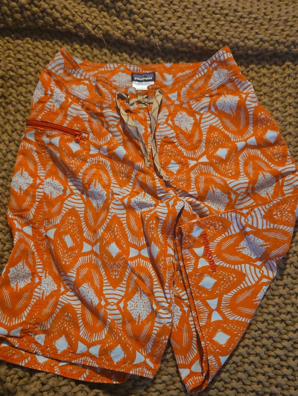 Patagonia Orange and White Printed Boys Board Shorts. Unlined.